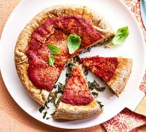 Spinach-stuffed pizza pies