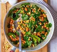 Spinach with chickpeas, pine nuts & raisins
