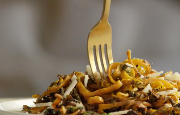 Spiralized sweet potatoes with kale pesto
