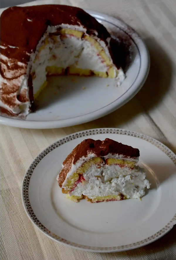 Sponge dome filled with ricotta, cream, candied fruit and nuts (Zuccotto)