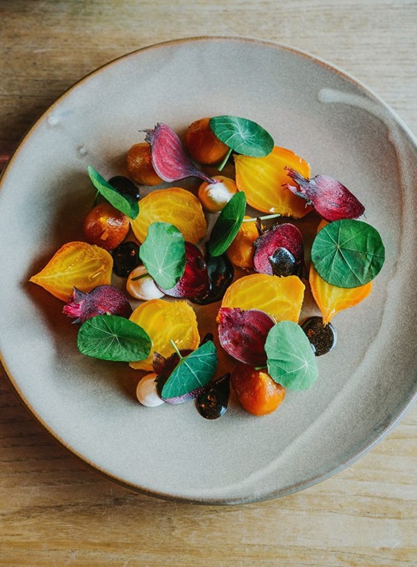Spring beets with goat's cheese, nasturtium & black garlic vinaigrette