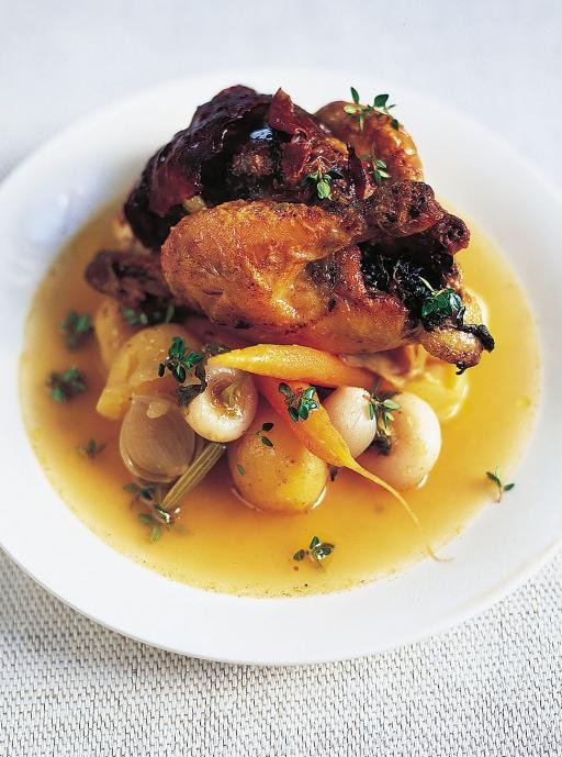 Spring chicken stuffed with black pudding and with braised baby vegetables
