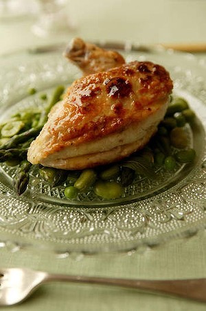 Spring chicken with asparagus, peas and broad beans