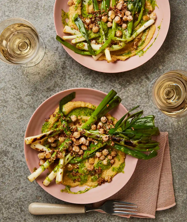 Spring onions with roast garlic and chickpea mash