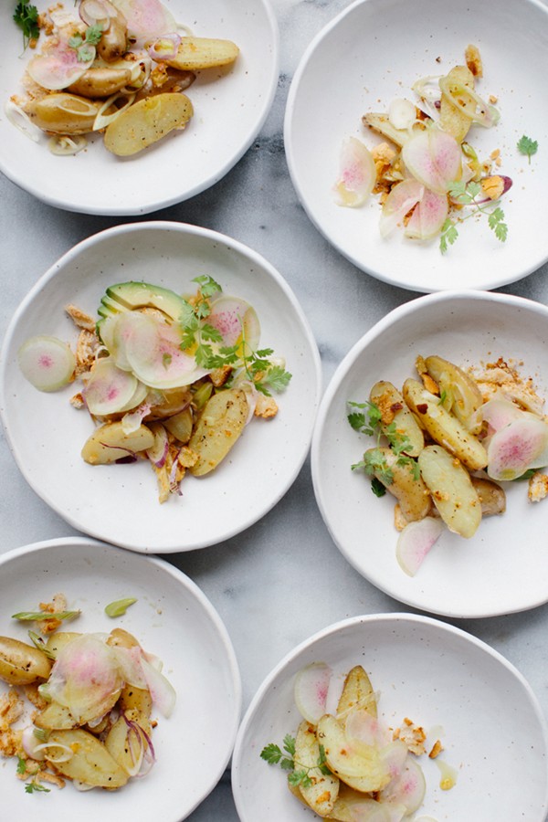 Spring potato salad with avocado, radishes, and mustard croutons