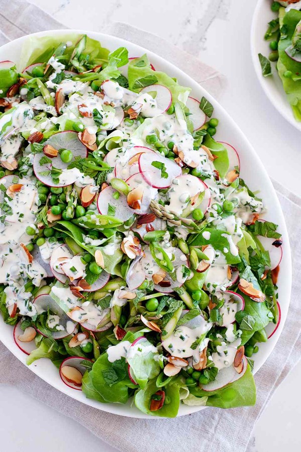 Spring vegetable salad with asparagus, peas and radishes