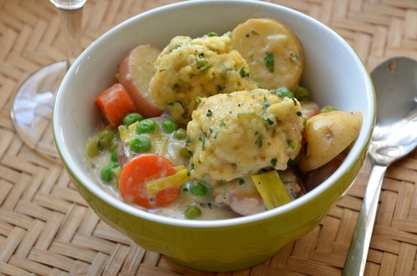 Spring vegetables with herbed cornmeal dumplings