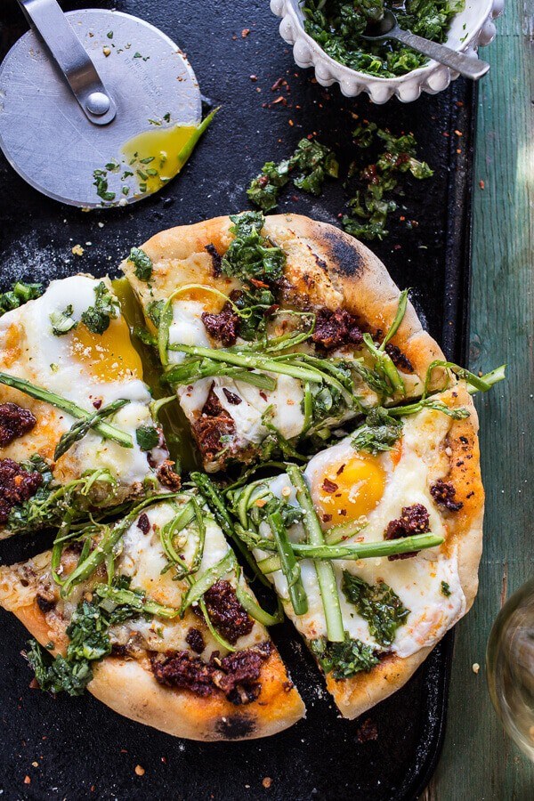Springtime pizza with chipotle romesco, eggs + shaved asparagus salad