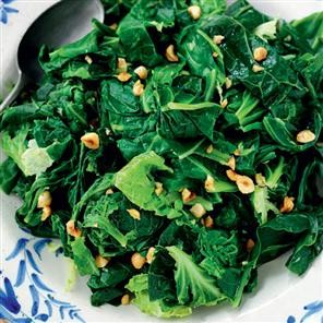 Sprout tops with browned butter and hazelnuts