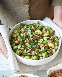 Sprouts, sugar snaps and spring onions with orange, hazelnut & rosemary butter