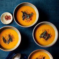 Squash and carrot soup with crispy sage leaves