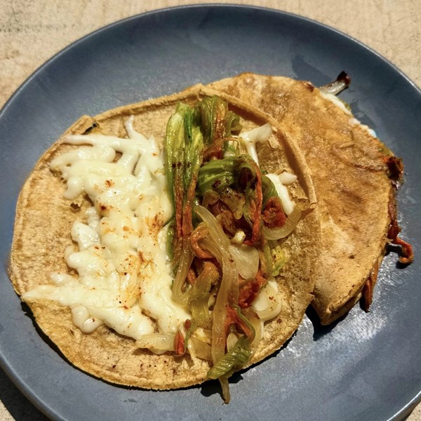 Squash blossom quesadillas with pasilla chili powder