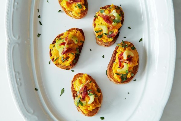 Squash butter crostini with blue cheese, celery, and bacon