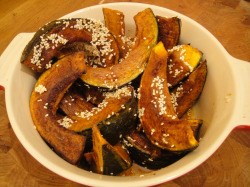 Squash half-moons with butter, sesame, and salt