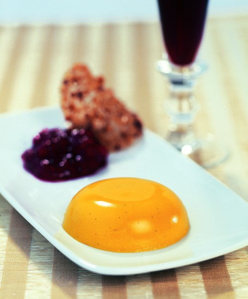 Squash panna cotta with cranberry compote and walnut tuiles