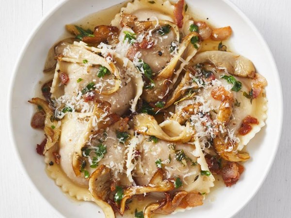 Squash ravioli with mushrooms and pancetta