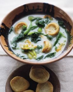 Squash vine in a green mole soup with crispy masa dumplings (Guias en mole verde y chochoyotes)