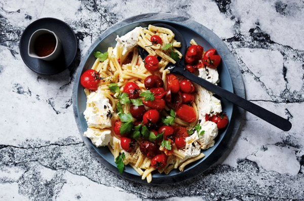 Squashed tomato and black garlic labneh pasta salad