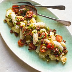 Squid and new potatoes with fried chorizo dressing
