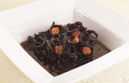 Squid braised in red wine and tomato