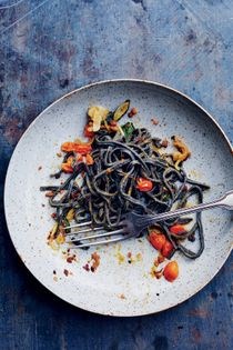 Squid ink chitarra with anchovies