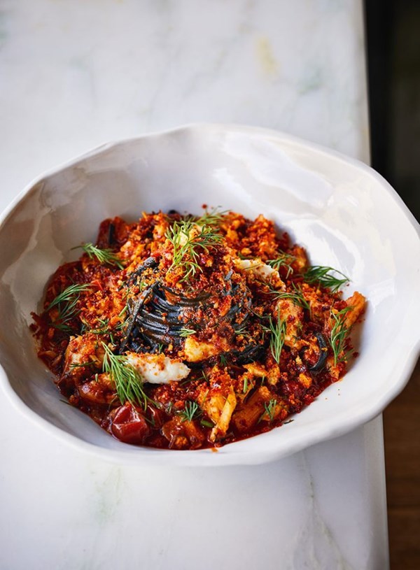 Squid ink linguine with market fish ragù 'nduja crumb & dill