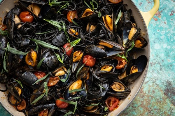 Squid ink spaghetti with mussels and tomato confit