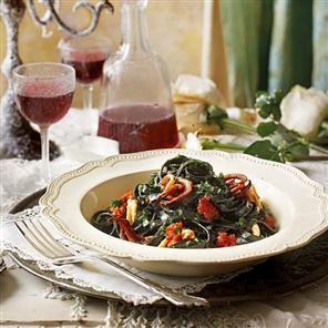 Squid ink tagliatelle with crispy chorizo and sherry
