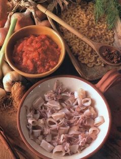 Squid or cuttlefish with dill and green olives (Kalamarakia me anitho ke prassines elies)