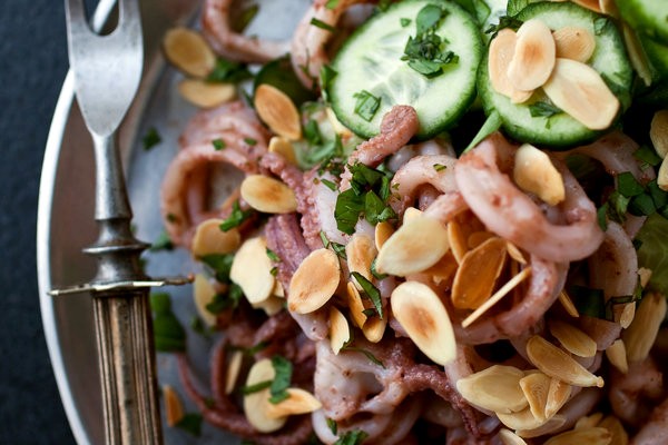 Squid salad with cucumbers, almonds and pickled plum dressing