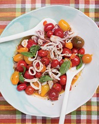 Squid with burst cherry tomatoes
