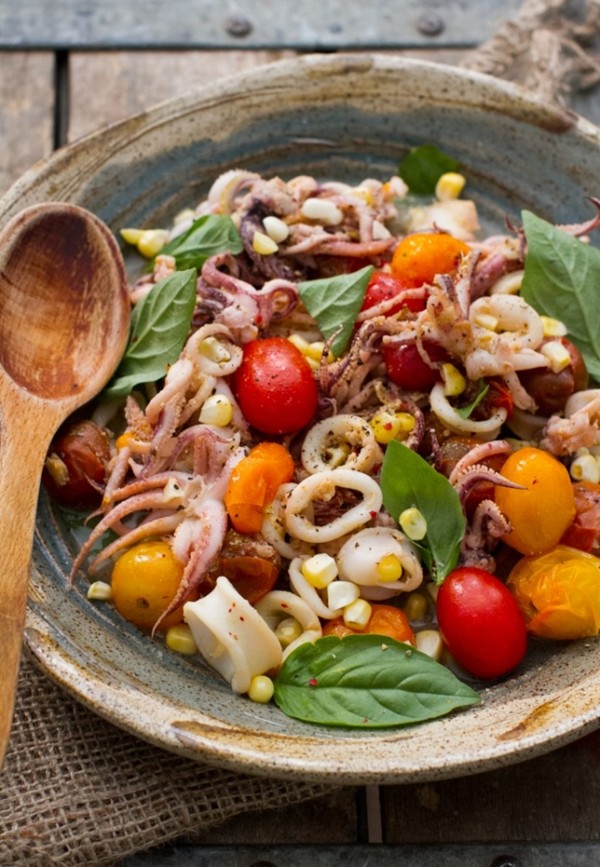 Squid with burst cherry tomatoes