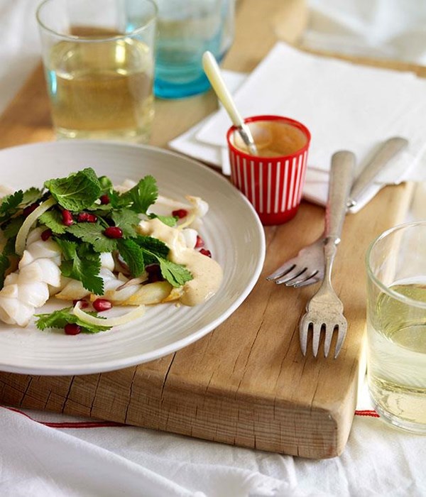 Squid with pomegranate and herb salad