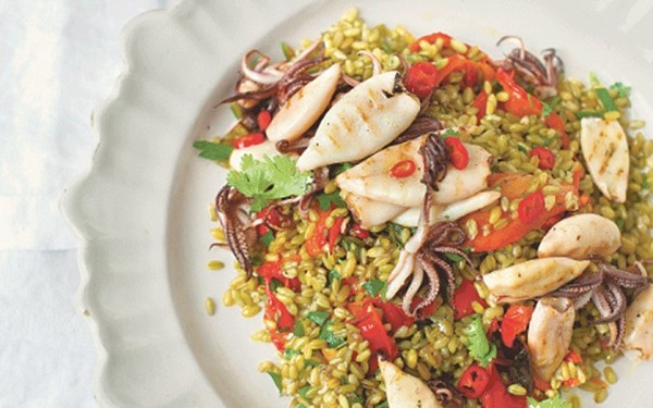 Squid with smoky almond tarator, peppers and freekeh