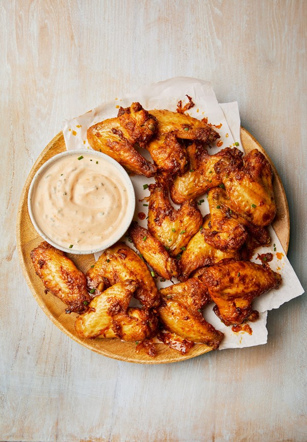 Sriracha chicken wings with Sriracha and sour cream dip