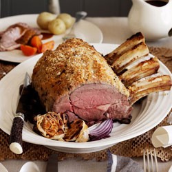Standing rib roast with horseradish crust and honey glazed carrots