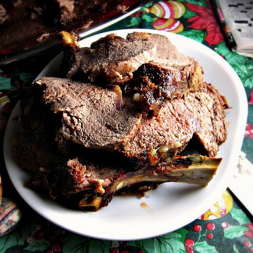 Standing rib roast with porcini and bacon sauce