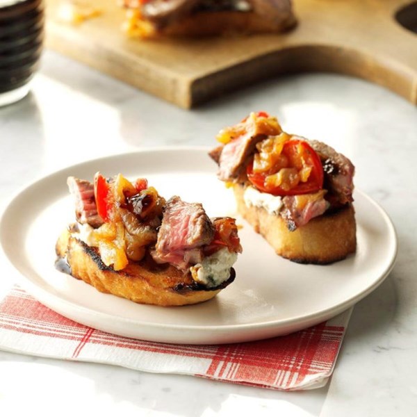 Steak & blue cheese bruschetta with onion & roasted tomato jam