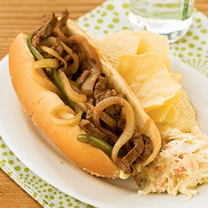 Steak and cheese sandwiches with mushrooms