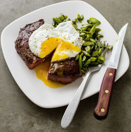 Steak and eggs with asparagus