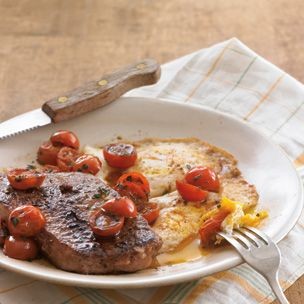 Steak and eggs with herbed cherry tomatoes 