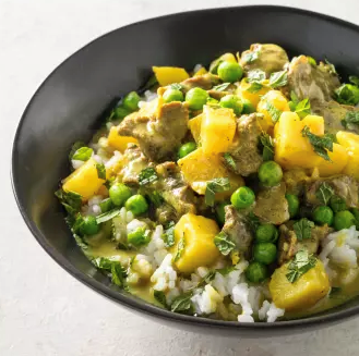 Steak and potato curry with peas