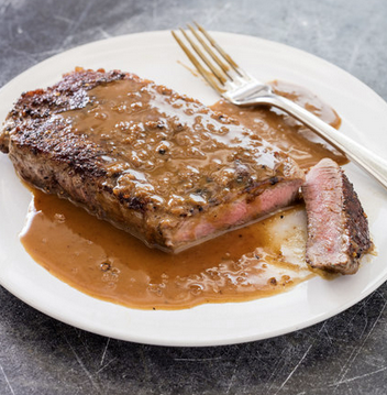 Steak au poivre with brandied cream sauce