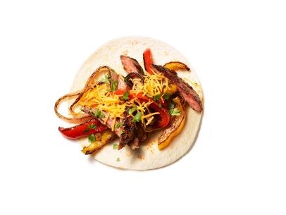 Steak fajitas with onions and peppers