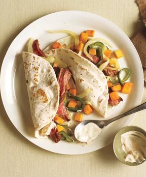 Steak fajitas with sweet potatoes and poblano