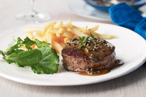 Steak frites with green peppercorn sauce