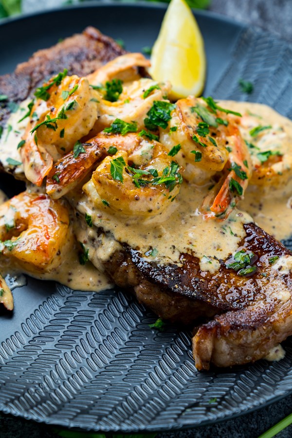 Steak in creamy Cajun shrimp sauce 