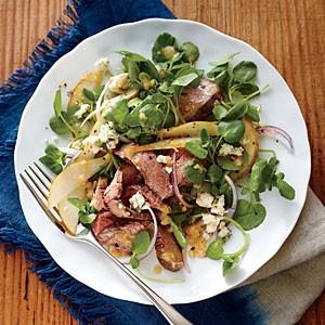 Steak, pear, and watercress salad