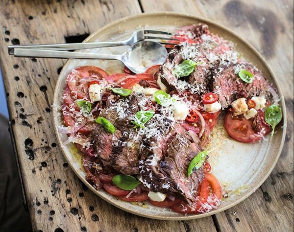 Steak, red onion and tomato salad 