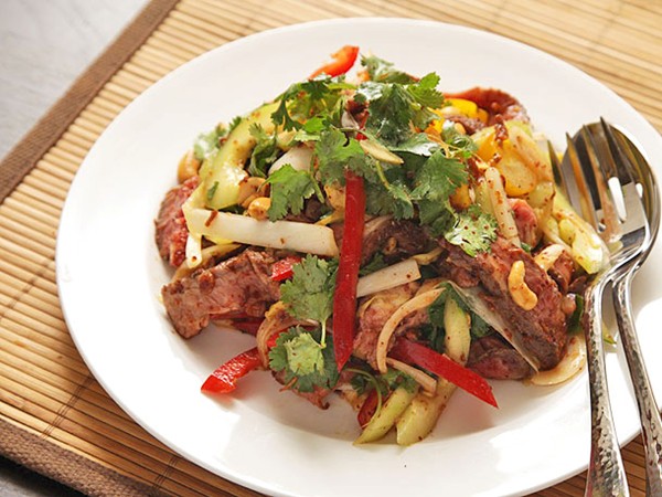Steak salad with cucumber, peppers, and spicy fish sauce vinaigrette